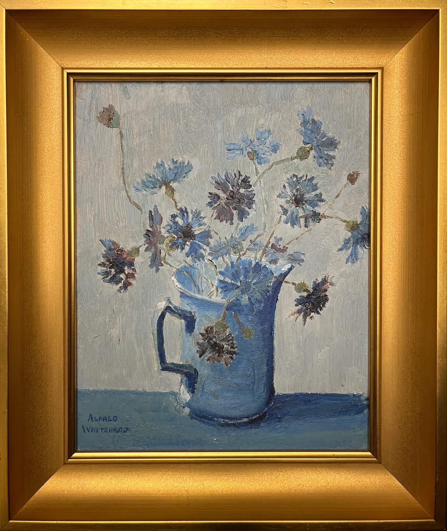 Flowers in Blue Pitcher