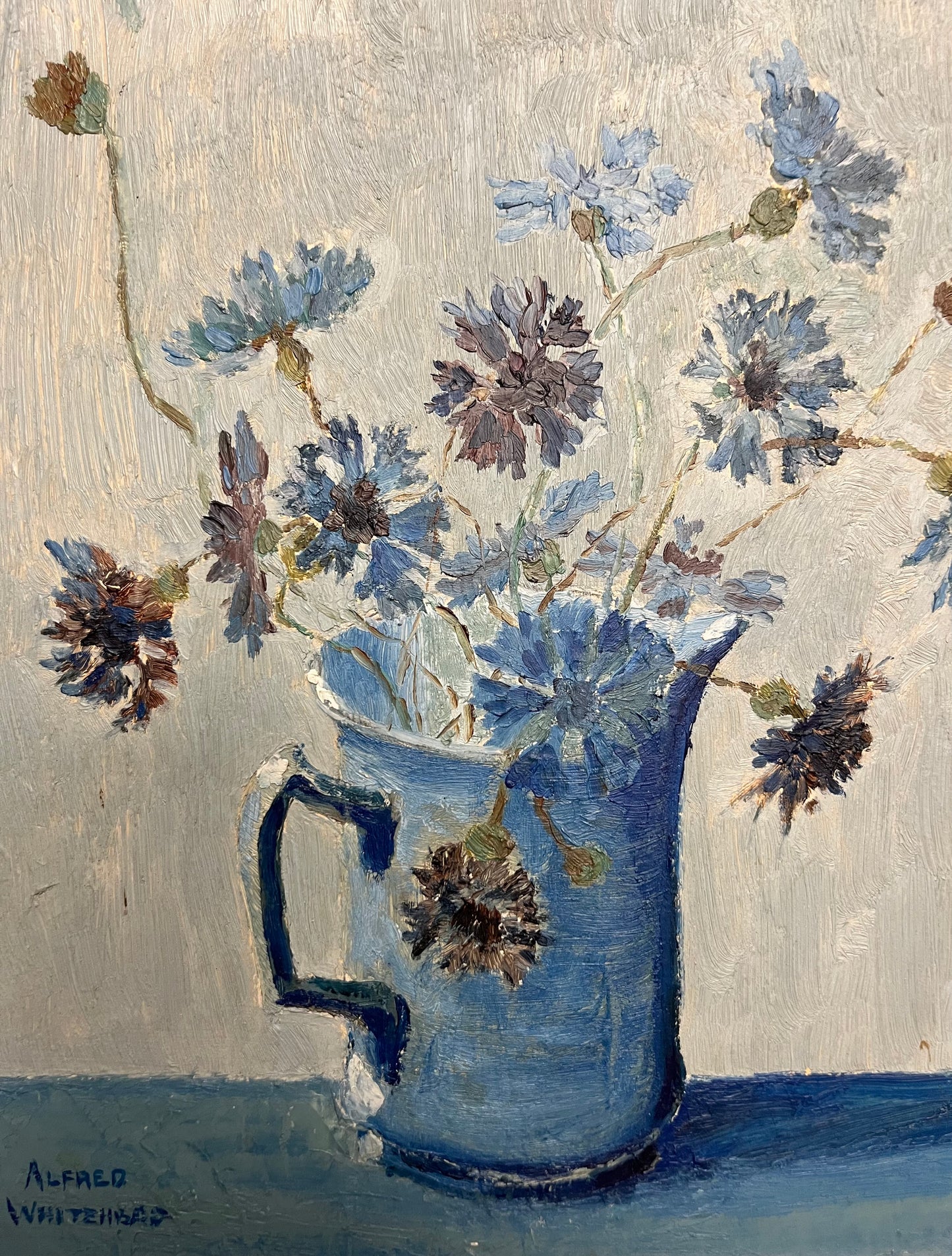 Flowers in Blue Pitcher